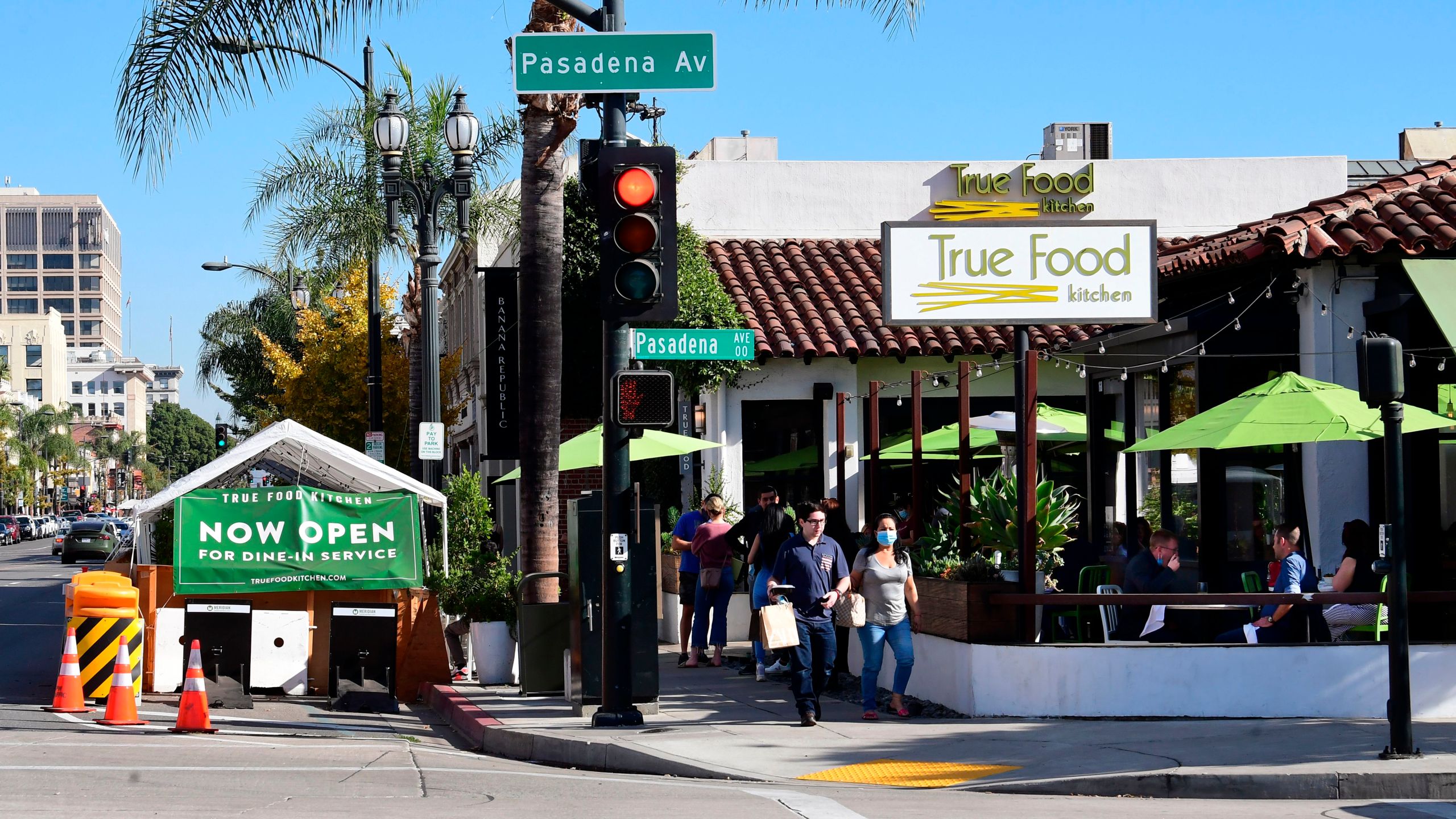 People dine outdoors in Pasadena, California, the only city in Los Angeles County still allowing that service on December 2, 2020. (Frederic J. Brown/AFP via Getty Images)