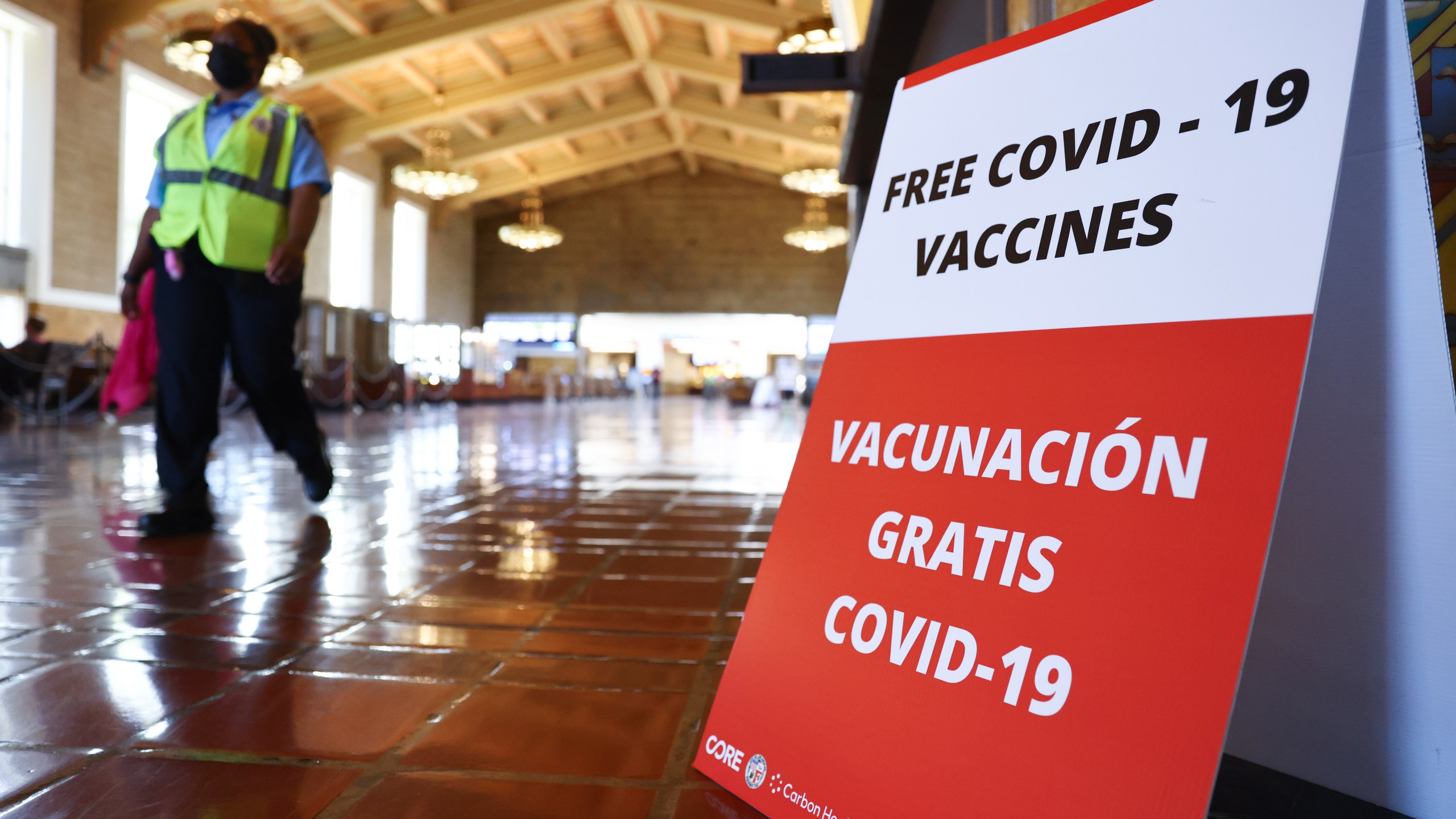 A sign advertises a free vaccination site set up inside L.A.'s Union Station in an effort to target commuters on June 10, 2021. (Mario Tama/Getty Images)