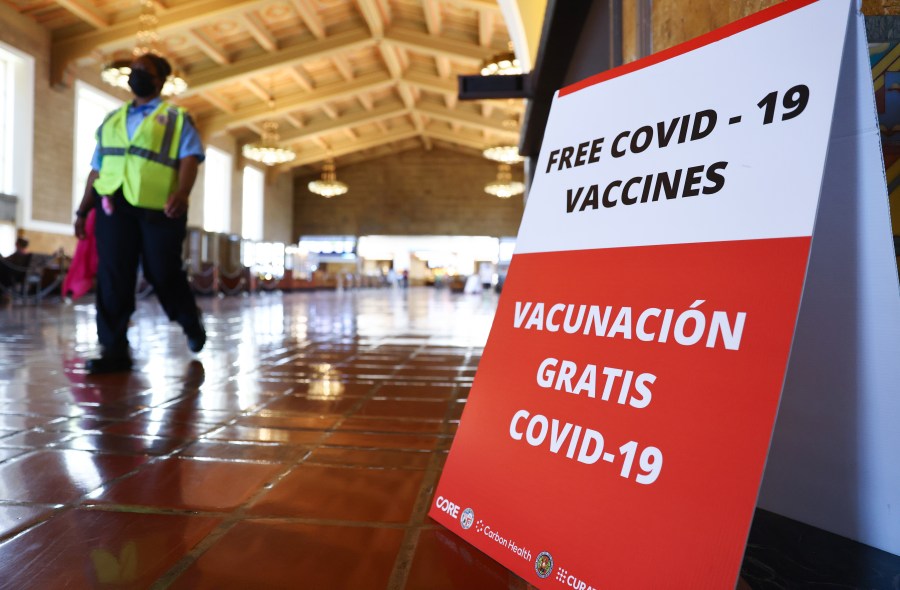 A sign advertises a free vaccination site set up inside L.A.'s Union Station in an effort to target commuters on June 10, 2021. (Mario Tama/Getty Images)