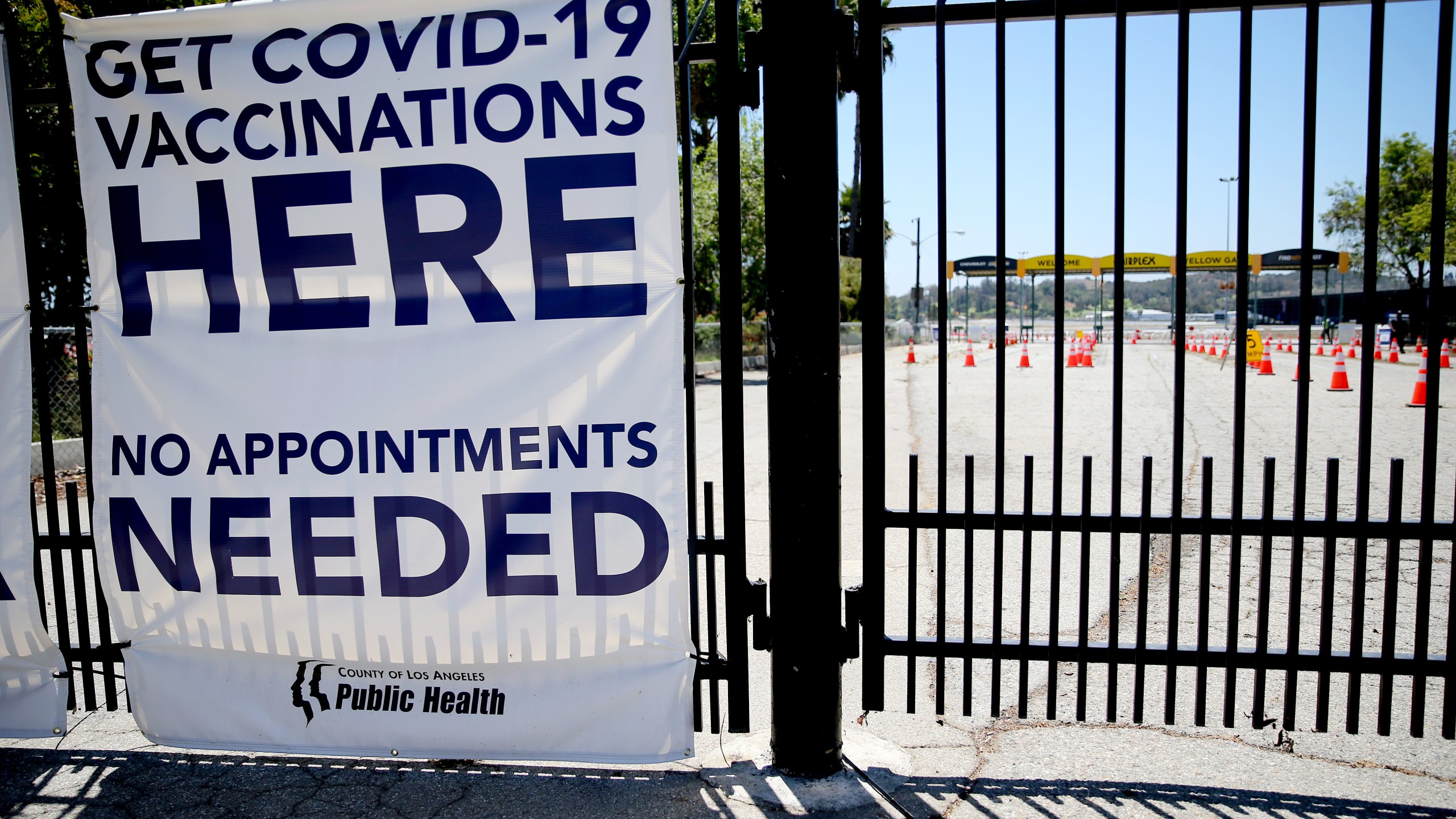 A sign promotes a nearly empty mass vaccination site at the Pomona Fairplex on June 10, 2021 in Pomona, California. (Mario Tama/Getty Images)