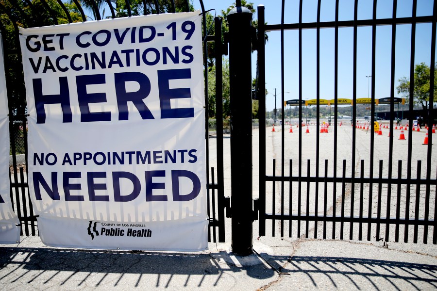 A sign promotes a nearly empty mass vaccination site at the Pomona Fairplex on June 10, 2021 in Pomona, California. (Mario Tama/Getty Images)