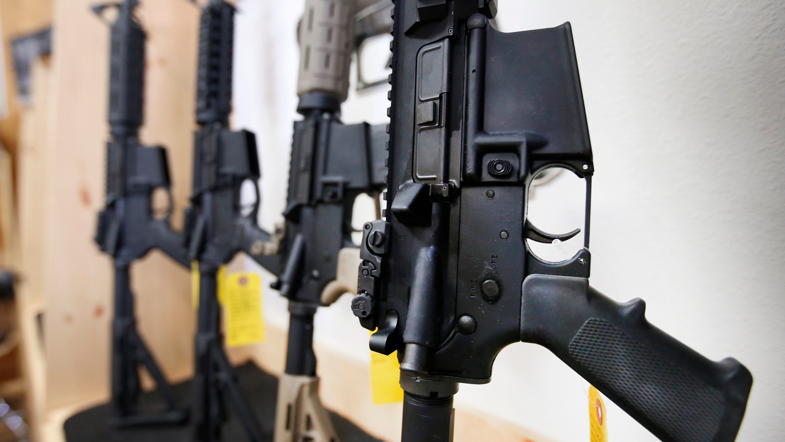 AR-15 semi-automatic guns are on display for sale at on June 17, 2016 in Springville, Utah. (George Frey/Getty Images)