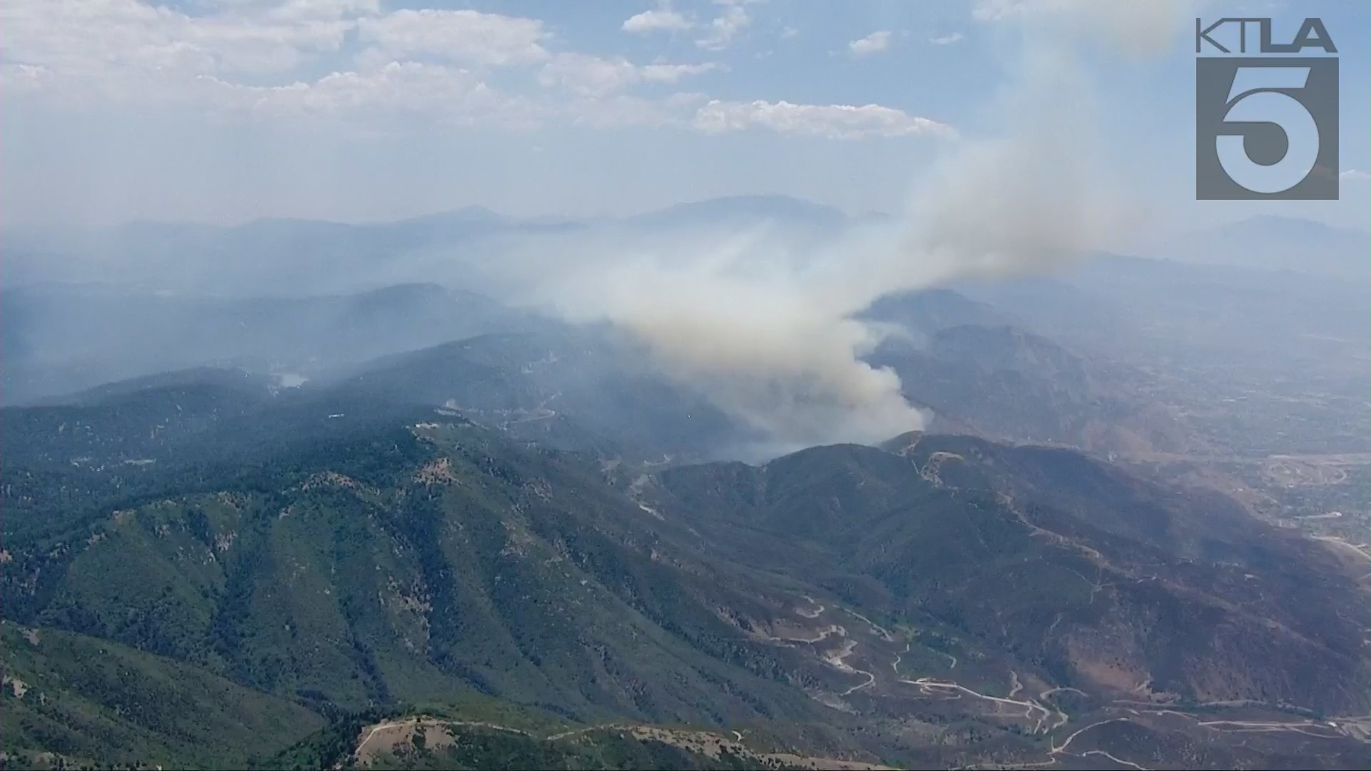 The Peak Fire burns above San Bernardino June 28, 2021.