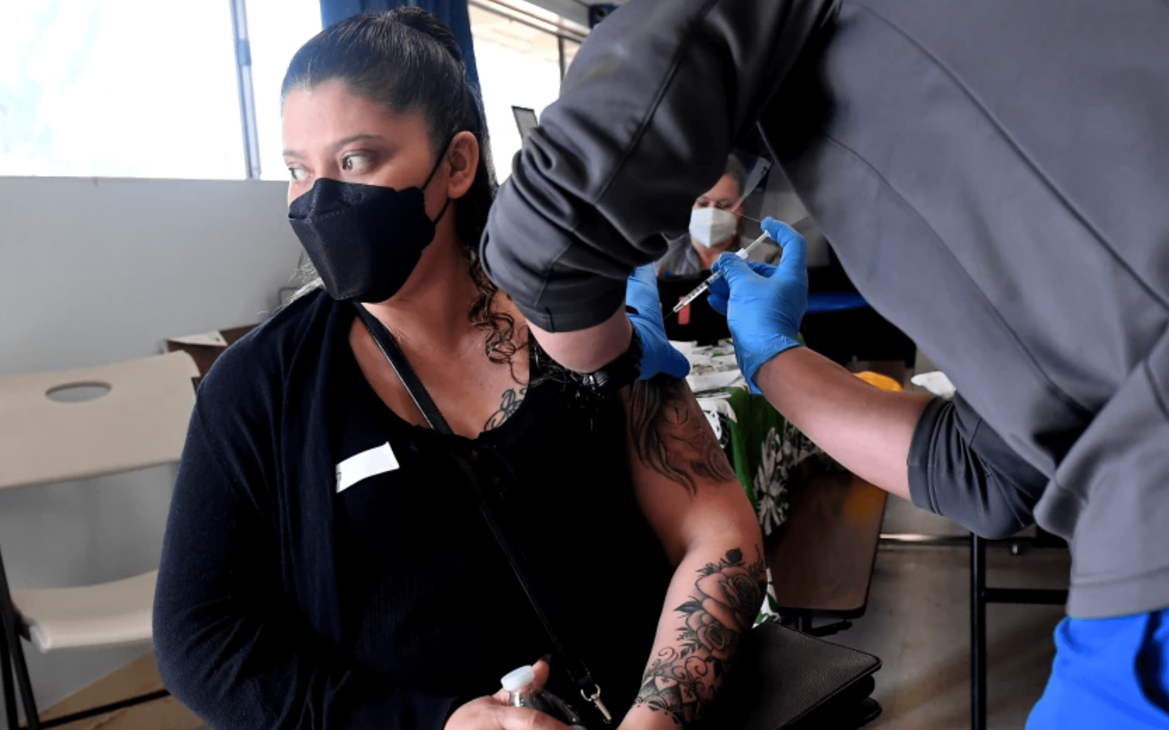 Magdalena Vargas receives a vaccine at a pop-up clinic in Hawaiian Gardens in April.(Wally Skalij / Los Angeles Times)