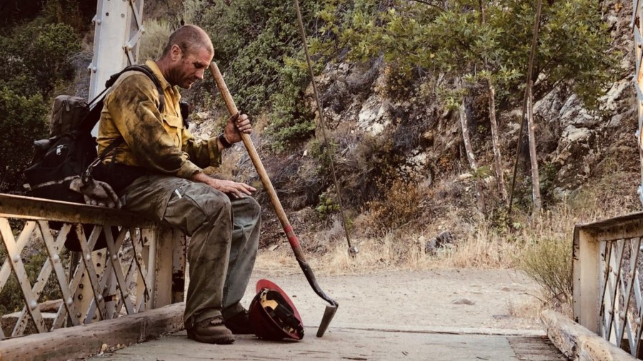 Capt. Justin Grunewald of the Mill Creek Hotshots takes a short rest amid a battle against the Willow fire.(U.S. Forest Service)