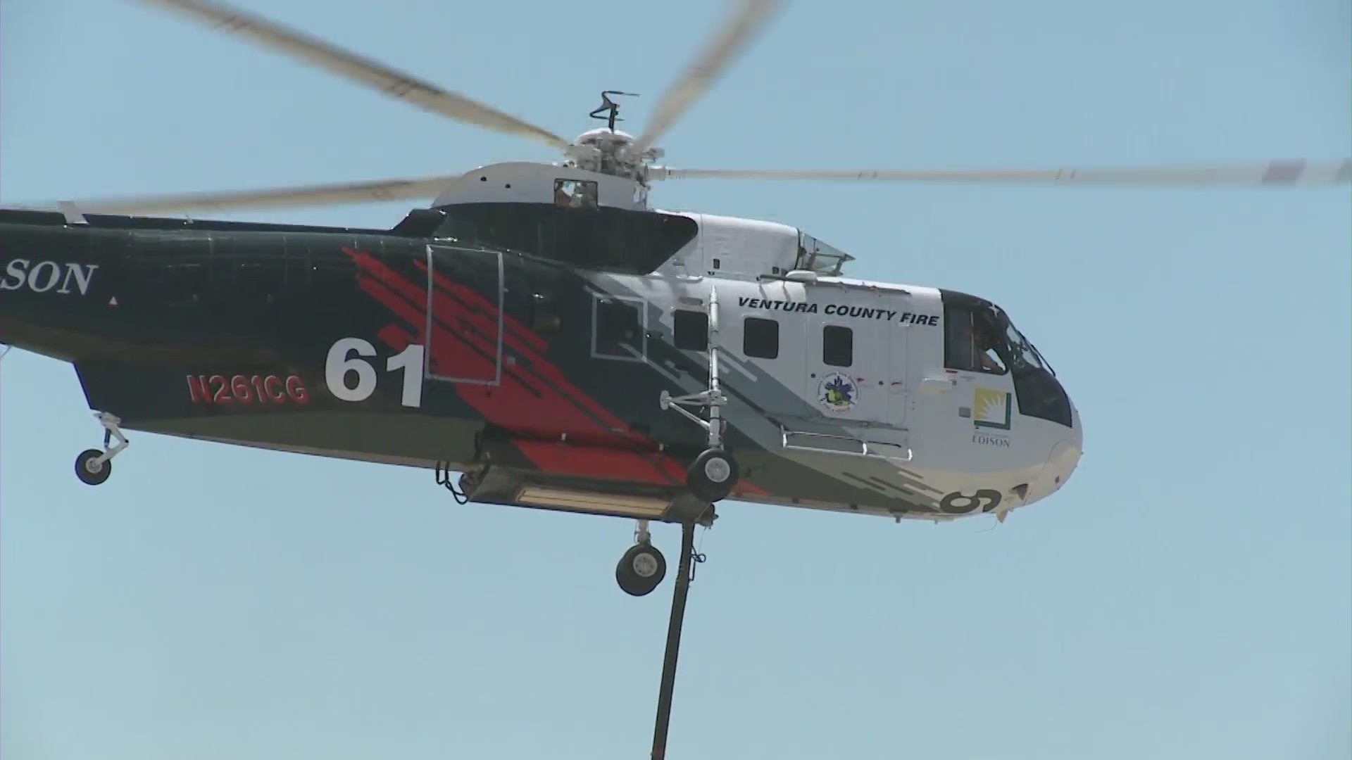 The Boeing Chinook helitankers will be able to drop retardant at night, something the agencies haven't been able to do previously, officials say. (KTLA)