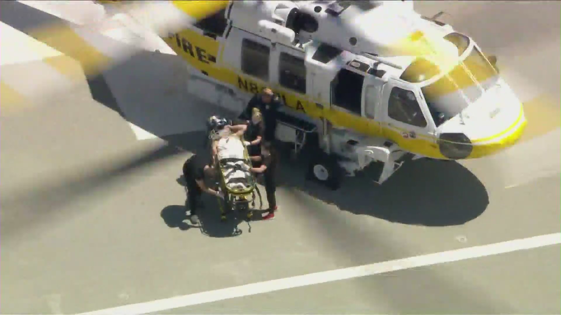 A critically wounded fire captain is airlifted to Henry Mayo Newhall Hospital on June 2, 2021. (KTLA)