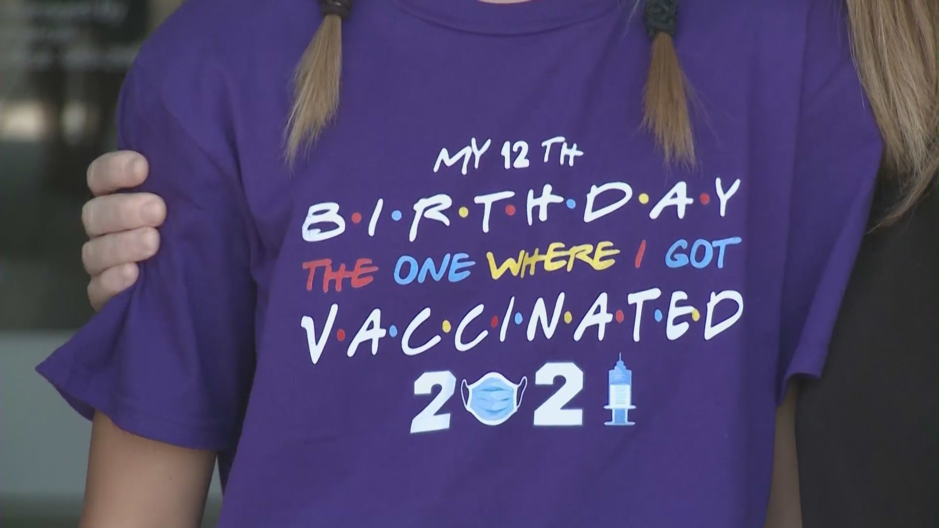 Sydney Hoag of Irvine celebrated turning 12 on July 23, 2021, by receiving her COVID-19 vaccine in Irvine. (KTLA)