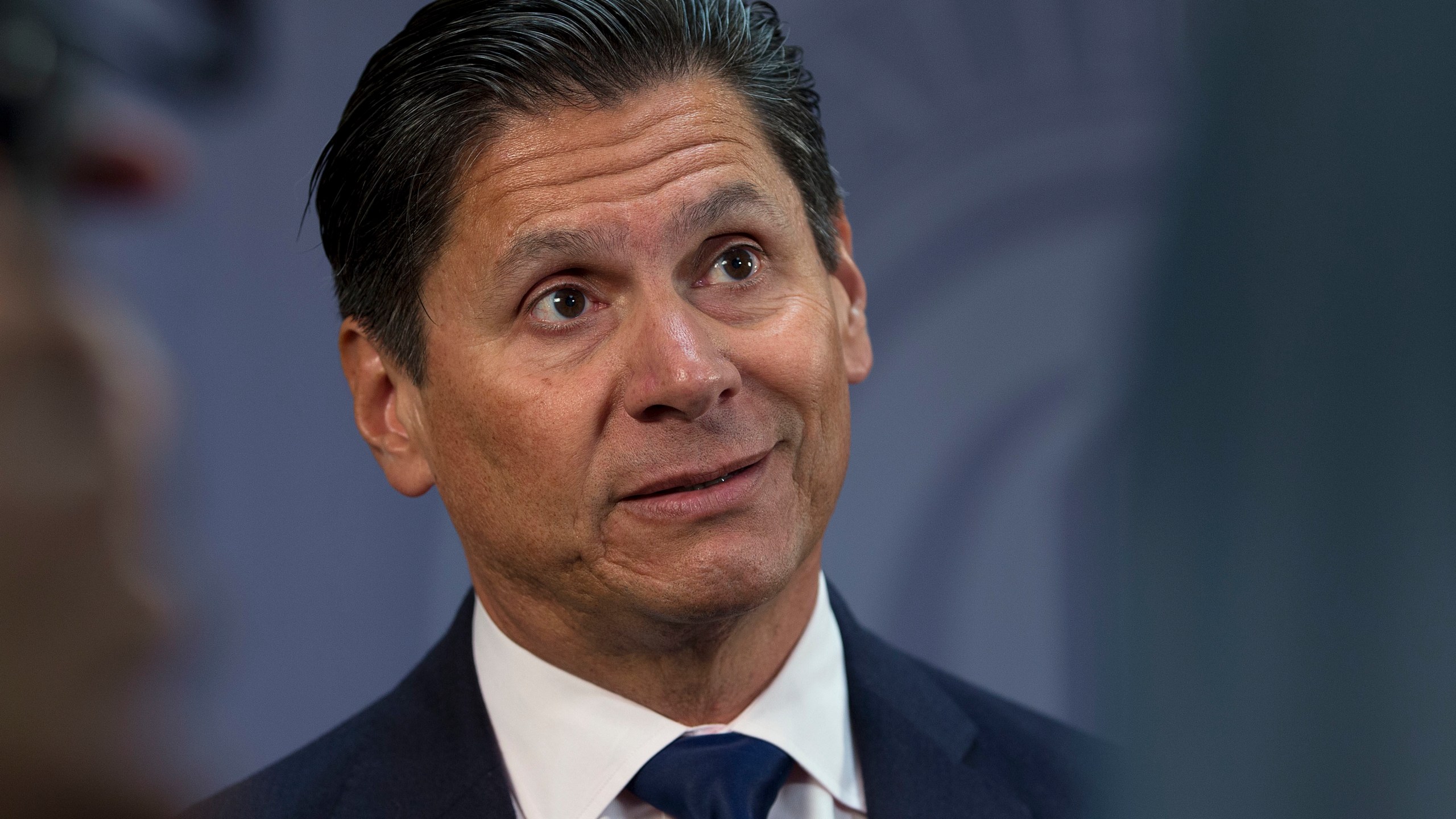 Eloy Ortiz Oakley talks to reporters after he was named chancellor of the California Community Colleges on July 18, 2016, in Sacramento. (Rich Pedroncelli/Associated Press)