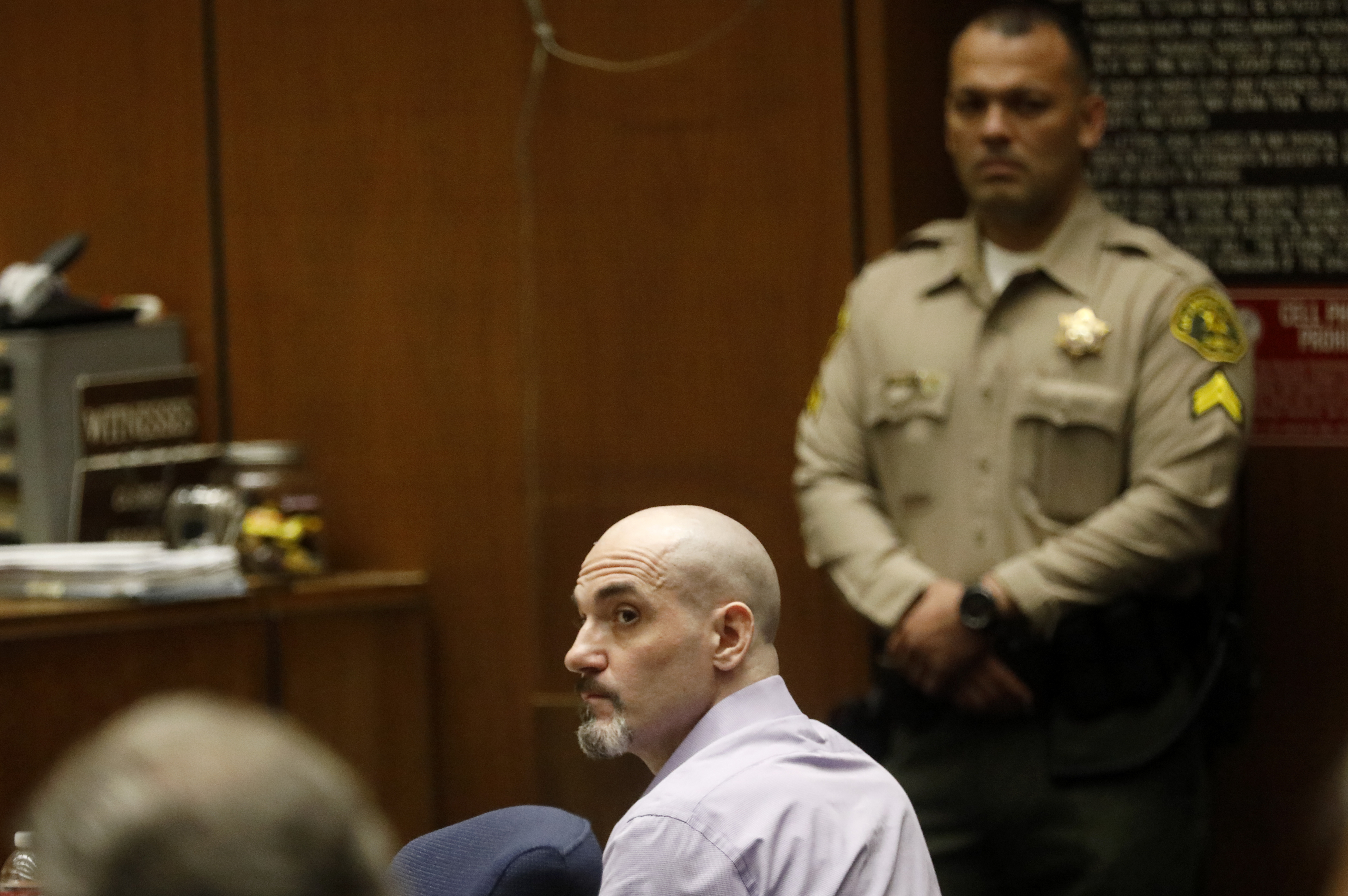 In this May 29, 2019, file photo, Michael Gargiulo listens to the testimony of actor Ashton Kutcher during Gargiulo's murder trial at Los Angeles Superior Court. Gargiulo has pleaded not guilty to two counts of murder and an attempted-murder charge stemming from attacks in the Los Angeles area between 2001 and 2008, including the death of Kutcher's former girlfriend, 22-year-old Ashley Ellerin. A judge is expected to give a death sentence Friday, Feb. 28, 2020. (Genaro Molina/Los Angeles Times via AP, Pool, File)