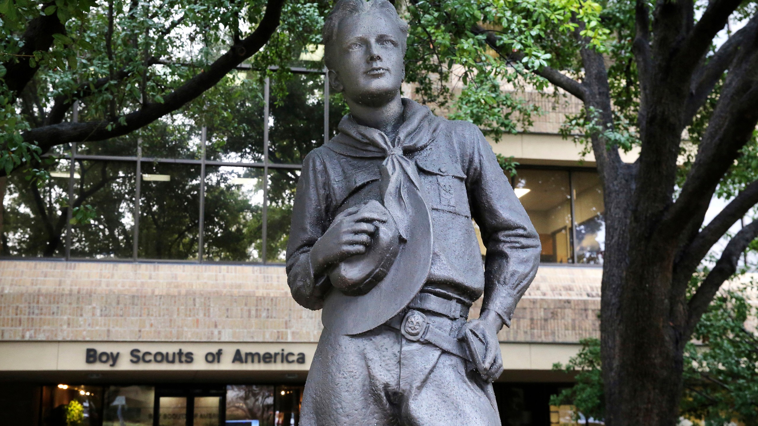 In this Feb. 12, 2020 file photo, a statue stands outside the Boy Scouts of America headquarters in Irving, Texas. The Boy Scouts of America have reached an agreement with attorneys representing some 60,000 victims of child sex abuse in what could prove to be a pivotal moment in the organization’s bankruptcy case. Attorneys for the BSA filed court papers late Thursday, July 1, 2021 outlining a restructuring support agreement, or RSA, with attorneys representing abuse victims. (AP Photo/LM Otero, File)