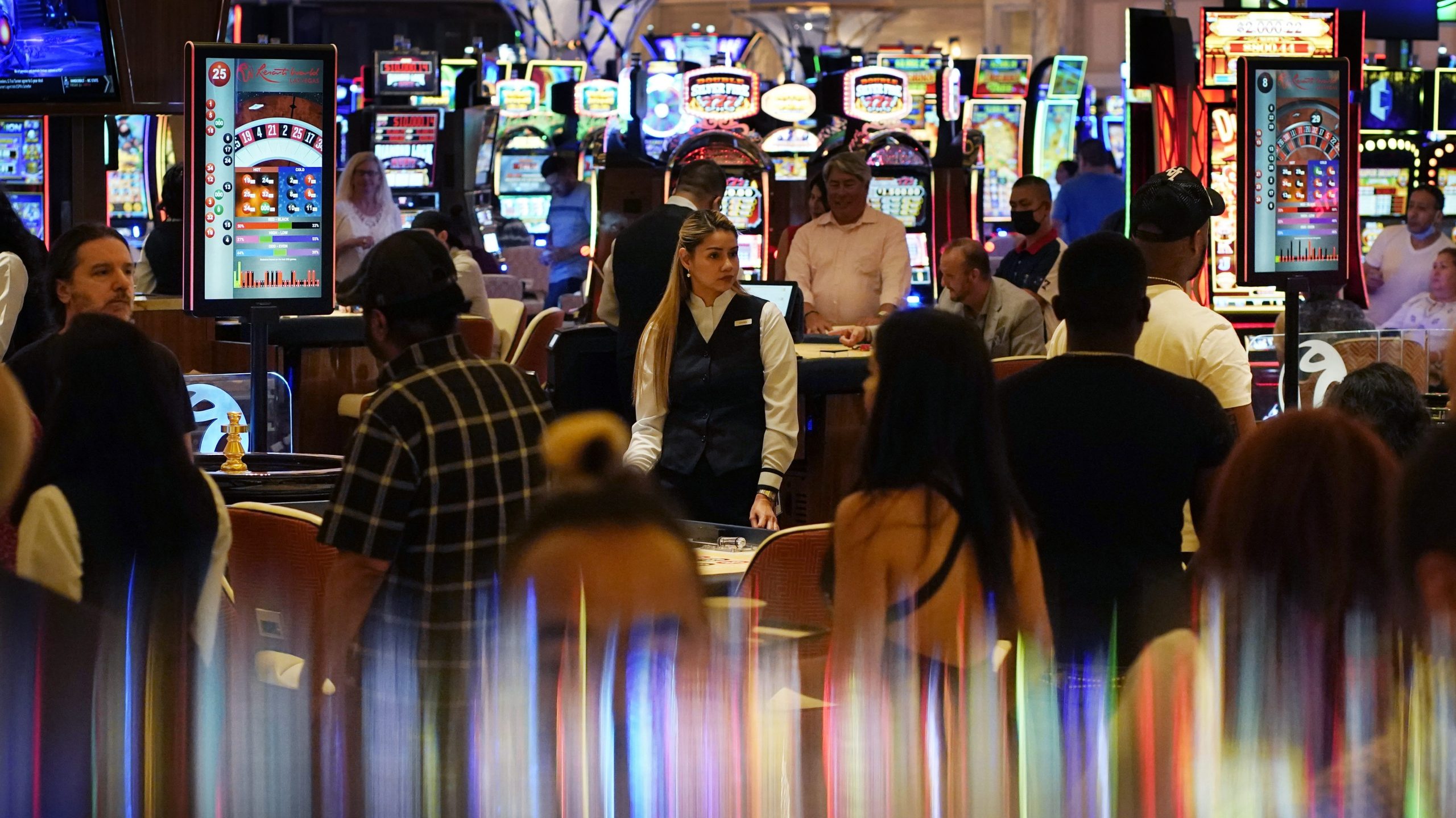 In this June 24, 2021, photo, crowds walk through the casino during the opening night of Resorts World Las Vegas in Las Vegas. (John Locher / Associated Press)