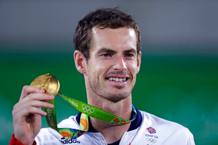 Andy Murray, of England, smiles as he holds up his gold medal at the 2016 Summer Olympics in Rio de Janeiro, Brazil, in this Sunday, Aug. 14, 2016, file photo. (AP Photo/Charles Krupa, File)