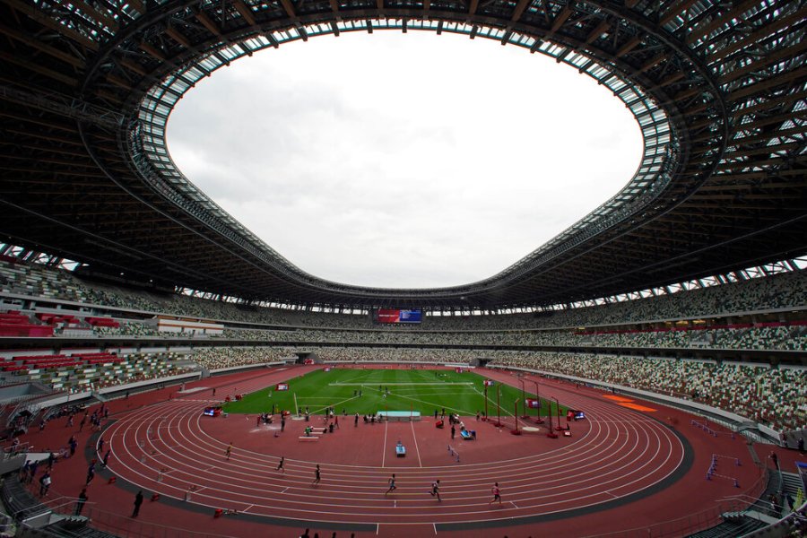 In this May 11, 2021, file photo, athletes compete in the men's 400-meter T20 race during an athletics test event for the Tokyo 2020 Paralympics Games at National Stadium in Tokyo. (AP Photo/Shuji Kajiyama, File)