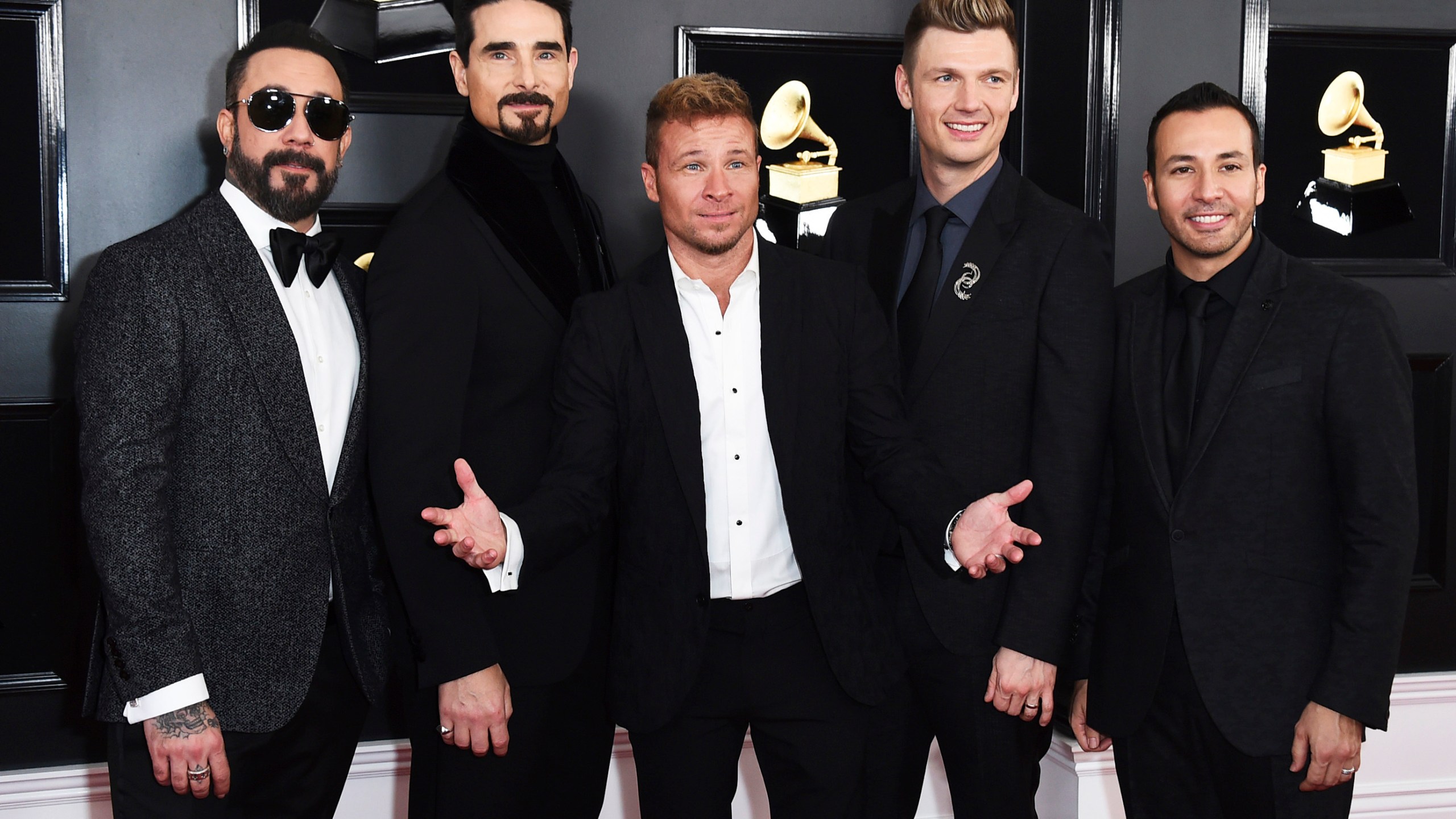 AJ McLean, from left, Kevin Richardson, Brian Littrell, Nick Carter, and Howie Dorough of The Backstreet Boys appear at the 61st annual Grammy Awards in Los Angeles on Feb. 10, 2019. The pioneering boy band is returning to the Las Vegas Strip with “A Very Backstreet Christmas Party,” a series of 12 holiday shows at the Planet Hollywood resort this November and December. (Photo by Jordan Strauss/Invision/AP, File)