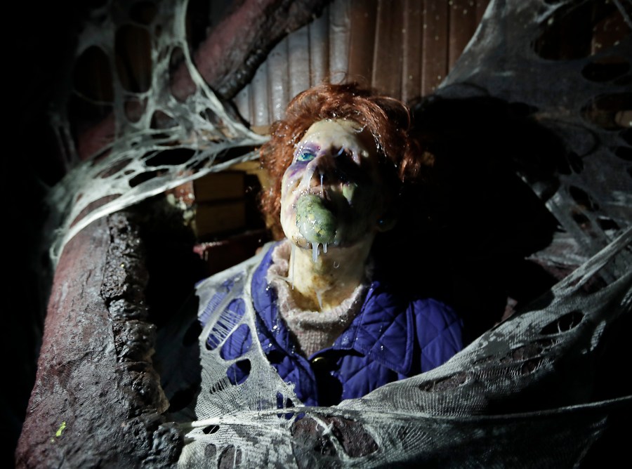 In this Sept. 12, 2018 file photo, the character Barb appears in grand, gory style in the Stranger Things haunted house during Halloween Horror nights at Universal Studios in Orlando, Fla. After a pandemic-related absence of a year, Halloween Horror Nights are back with haunted houses based on the “Texas Chainsaw Massacre” and “The Bride of Frankenstein" planned for Universal theme parks in California and Florida, the company announced Thursday, July 15, 2021. (AP Photo/John Raoux, File)