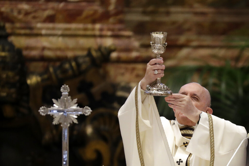 In this Thursday, April 1, 2021 file photo, Pope Francis celebrates a Chrism Mass inside St. Peter's Basilica, at the Vatican. (AP Photo/Andrew Medichini)