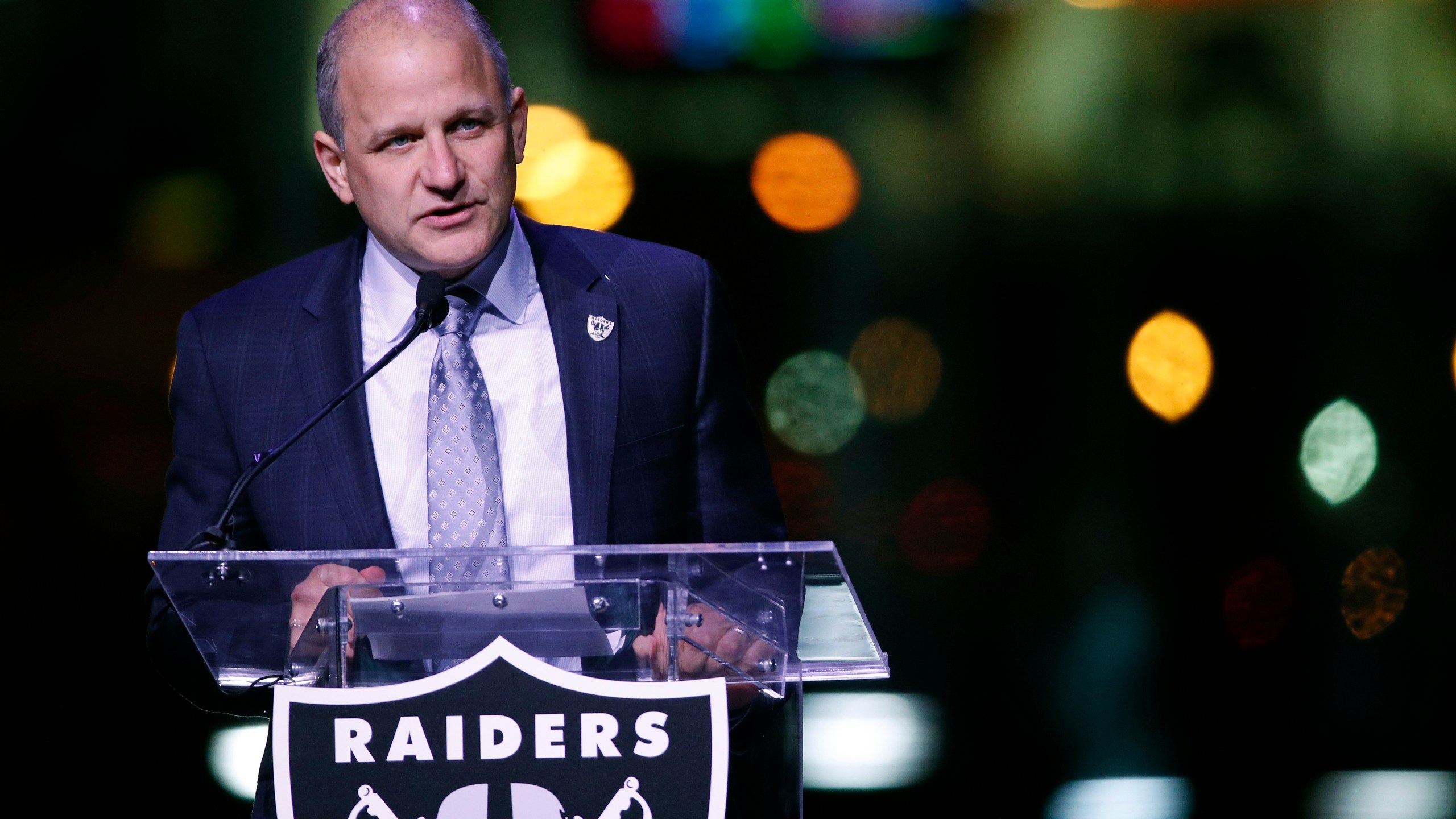 In this Nov. 13, 2017, file photo, Oakland Raiders President Marc Badain speaks during a ceremonial groundbreaking for the Raiders' stadium in Las Vegas. (AP Photo/John Locher, File)