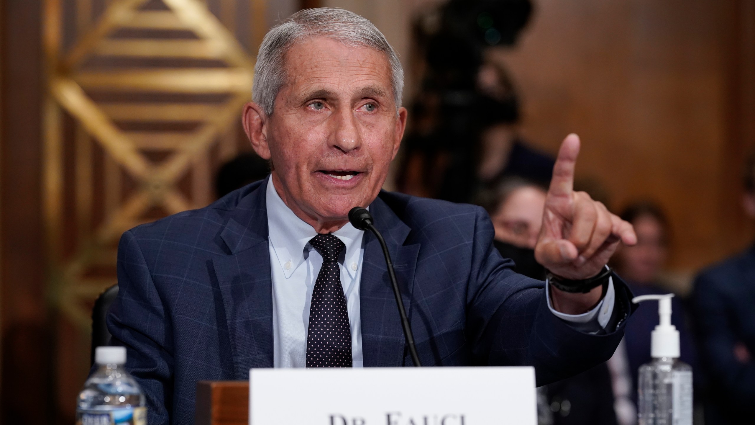 Top infectious disease expert Dr. Anthony Fauci responds to accusations by Sen. Rand Paul, R-Ky., as he testifies before the Senate Health, Education, Labor, and Pensions Committee, on Capitol Hill in Washington, Tuesday, July 20, 2021. Cases of COVID-19 have tripled over the past three weeks, and hospitalizations and deaths are rising among unvaccinated people. (AP Photo/J. Scott Applewhite, Pool)