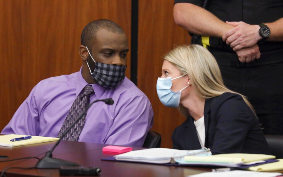 Defendant Nathaniel Rowland speaks with his attorney, Alicia Goode, right, during his trial in Richland County Court, Tuesday, July 20, 2021, in Columbia, S.C. (Tracy Glantz/The State via AP)