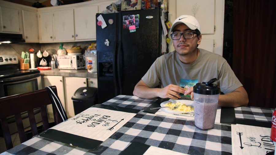 Samuel Alfaro, pauses between responses during an interview at his home in Houston, Texas, on July 23, 2021. (John L. Mone / Associated Press)