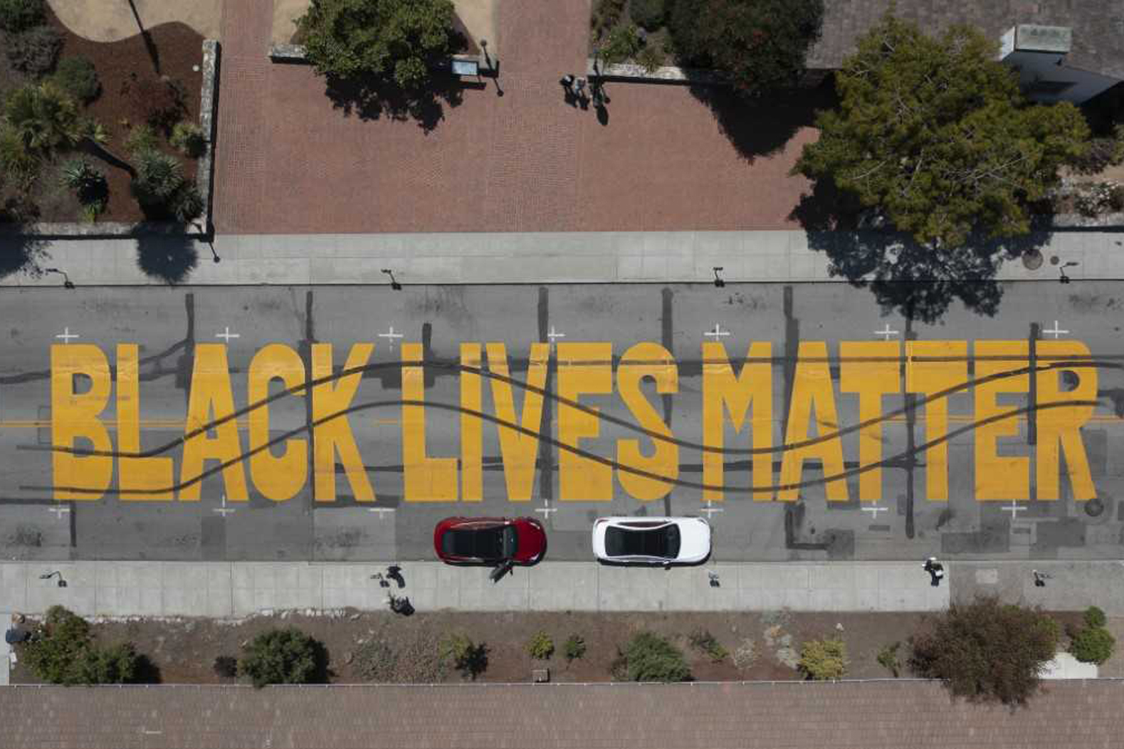 In this aerial photo provided by the Santa Cruz Police Department is a Black Lives Matter Mural painted on a street that was vandalized in Santa Cruz, Calif., on July 24, 2021. (Santa Cruz Police Department via AP)