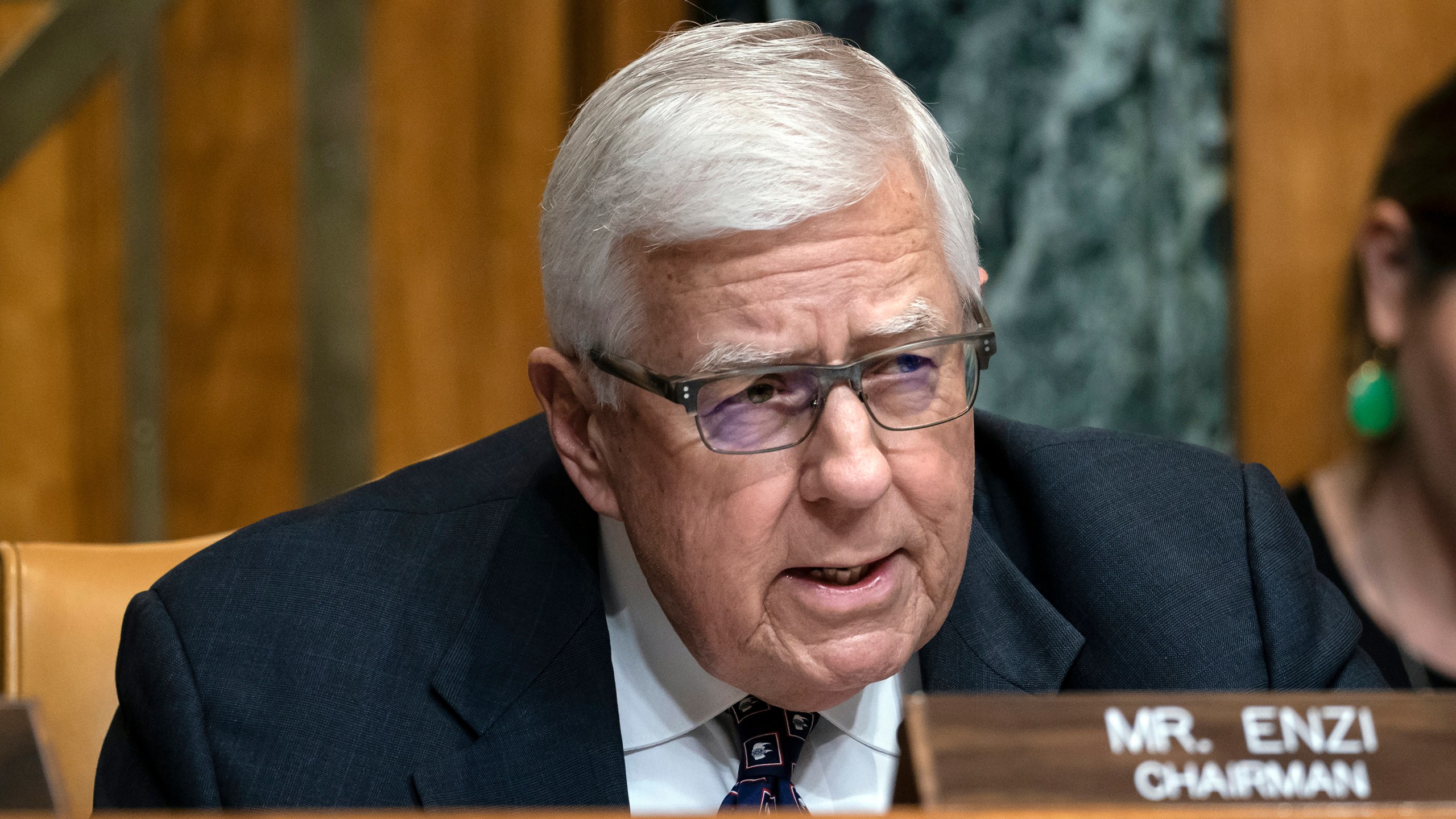 In this March 27, 2019, file photo, Sen. Mike Enzi, R-Wyo., chairman of the Senate Budget Committee, makes an opening statement on the fiscal year 2020 budget resolution, on Capitol Hill in Washington. Recently retired U.S. Sen. Mike Enzi of Wyoming died Monday, July 26, 2021. He was 77 years old. (AP Photo/J. Scott Applewhite, File)