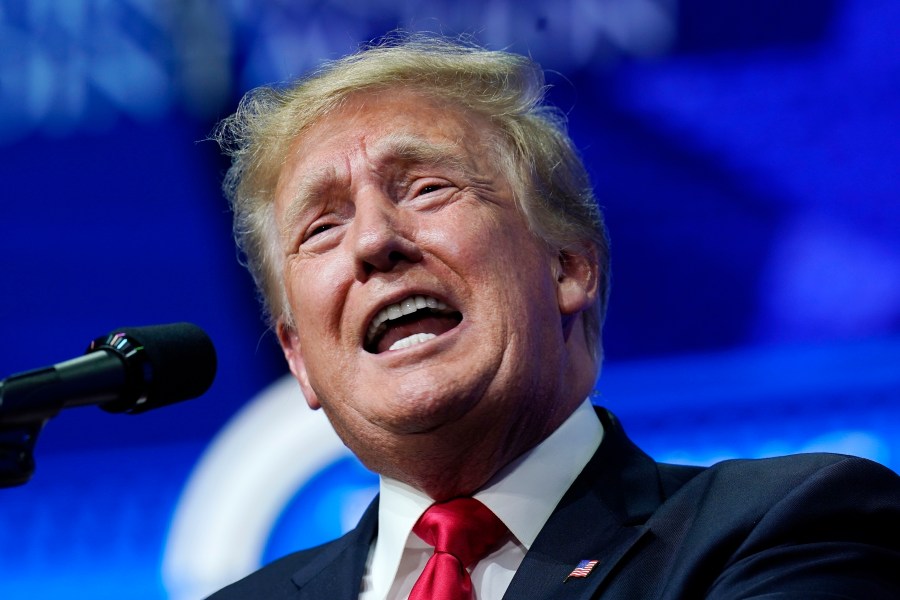 In this Saturday, July 24, 2021, file photo former President Donald Trump speaks on a variety of topics to supporters at a Turning Point Action gathering in Phoenix. Trump urged senior Justice Department officials to declare the 2020 election results “corrupt” in a December phone call. That's according to handwritten notes from one of the participants in the conversation. The notes of the Dec. 27 call were released Friday by the Democratic-led House Oversight Committee. (AP Photo/Ross D. Franklin, File)