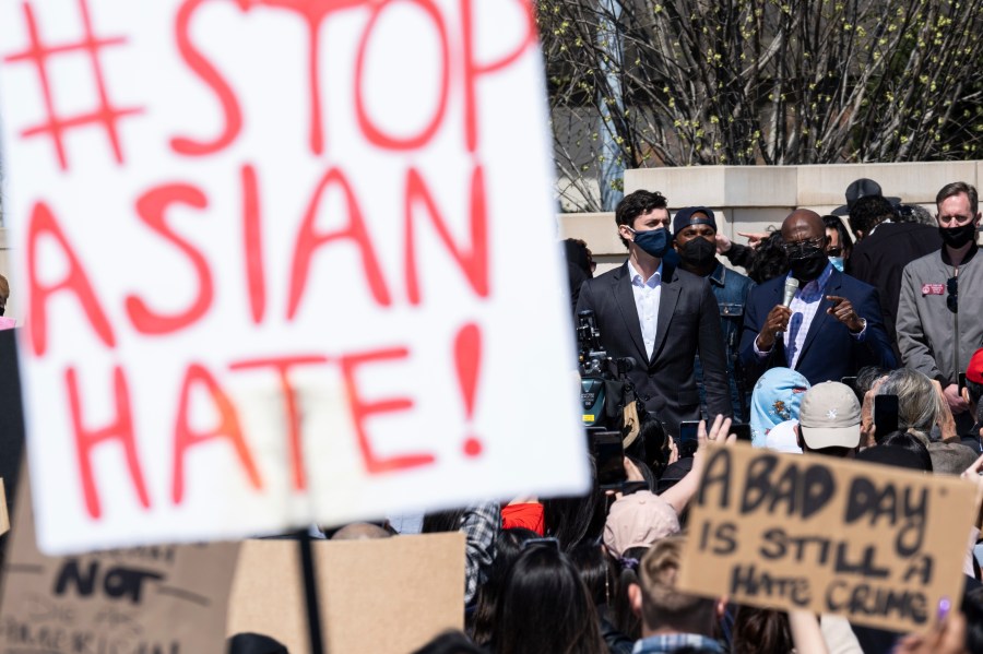 This March 20, 2021 file photo shows U.S. Sens. Jon Ossoff, D-Ga., and Raphael Warnock, D-Ga., speaking during a "stop Asian hate" rally outside the Georgia State Capitol in Atlanta. (Ben Gray/Associated Press)