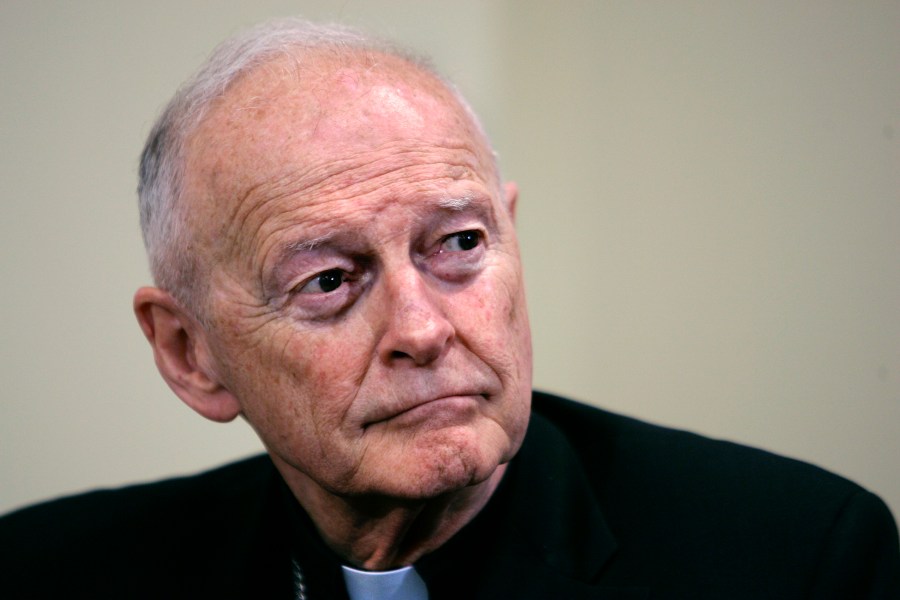 In this May 16, 2006 file photo former Washington Archbishop, Cardinal Theodore McCarrick pauses during a press conference in Washington. McCarrick, the once-influential American cardinal who was defrocked after a Vatican investigation confirmed he had sexually molested adults as well as children, has been charged with sexually assaulting a 16-year-old boy during a wedding reception at Wellesley College in the 1970s, court records show. (AP Photo/J. Scott Applewhite, File)