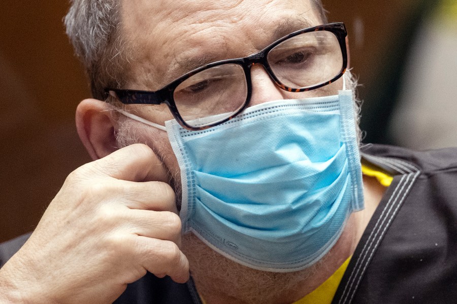 Harvey Weinstein, the 69-year-old convicted rapist and disgraced movie mogul, wears a face mask as he listens in court during a pre-trial hearing in Los Angeles, on July 29, 2021. (Etienne Laurent/Pool Photo via AP)