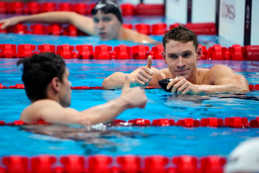 The United States' Ryan Murphy, right, gives a thumbs up to Evgeny Rylov, of Russian Olympic Committee, after Rylov won the men's 200-meter backstroke final at the 2020 Summer Olympics, Friday, July 30, 2021, in Tokyo, Japan. (AP Photo/David Goldman)