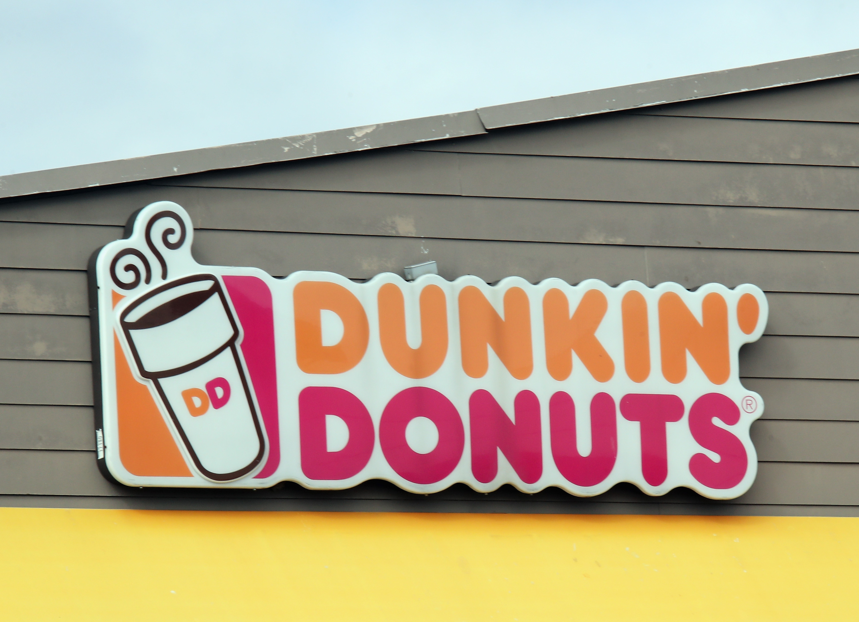 This file photo shows a Dunkin' Donuts store sign. (Bruce Bennett/Getty Images)