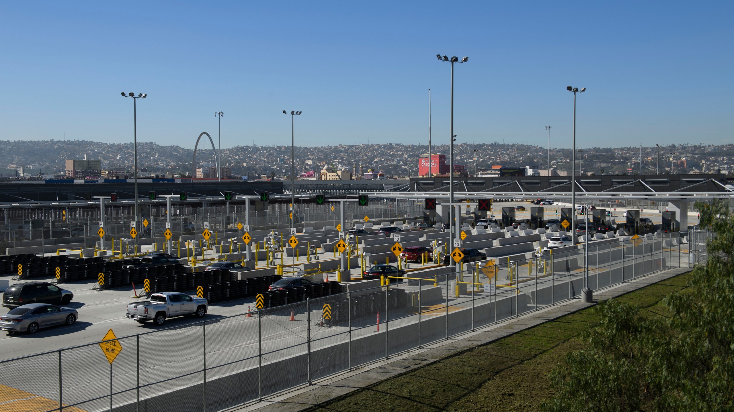 Vehicles enter a border checkpoint at the San Ysidro Port of Entry at the U.S.- Mexico border on Feb. 19, 2021 in San Diego. (PATRICK T. FALLON/AFP via Getty Images)