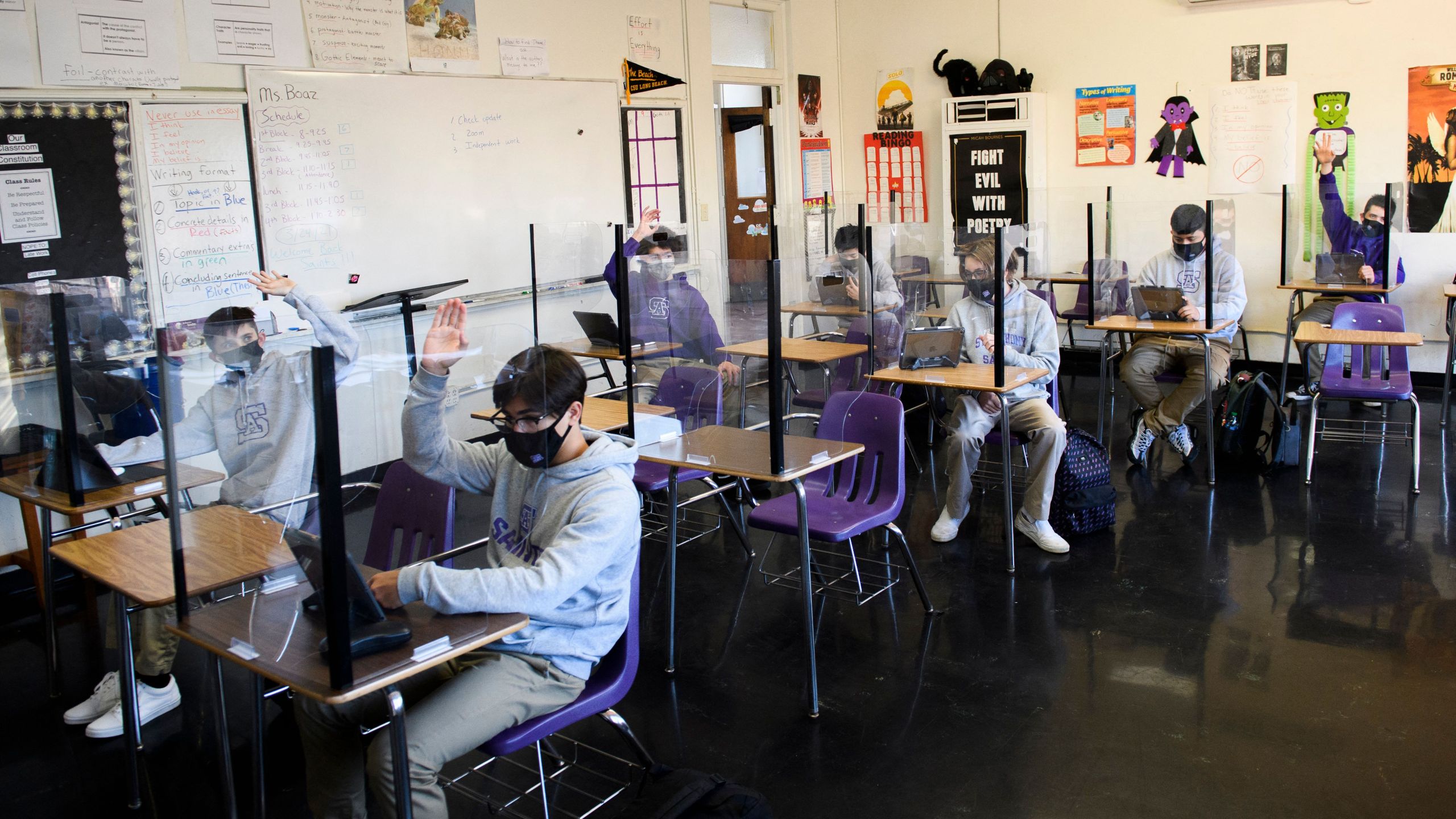 Students attend an in-person English class at St. Anthony Catholic High School on March 24, 2021 in Long Beach, California. (PATRICK T. FALLON/AFP via Getty Images)