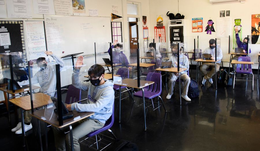 Students attend an in-person English class at St. Anthony Catholic High School on March 24, 2021 in Long Beach, California. (PATRICK T. FALLON/AFP via Getty Images)