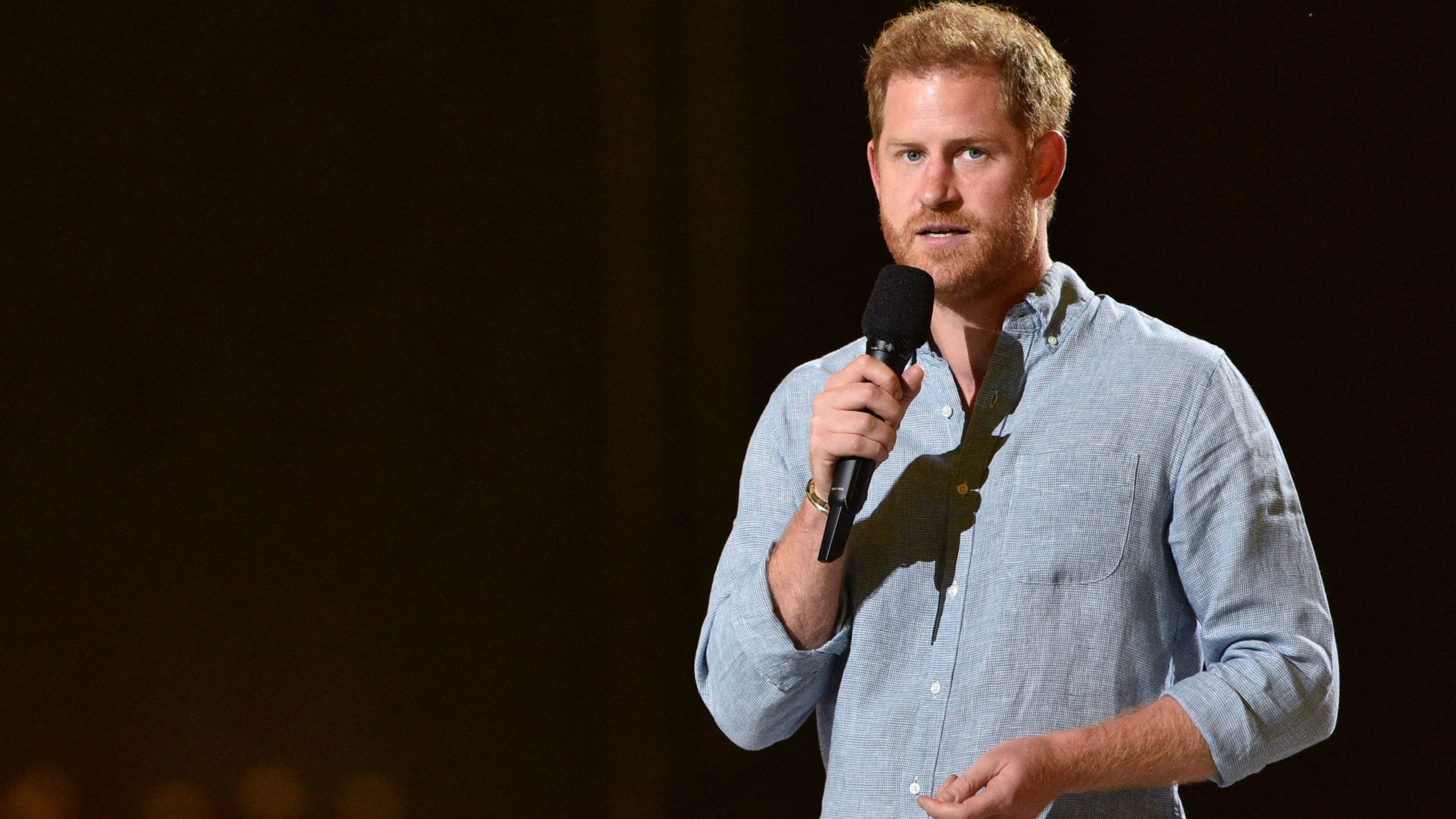 Prince Harry, Duke of Sussex gestures as he speaks onstage during the taping of the "Vax Live" fundraising concert at SoFi Stadium in Inglewood on May 2, 2021. (VALERIE MACON/AFP via Getty Images)