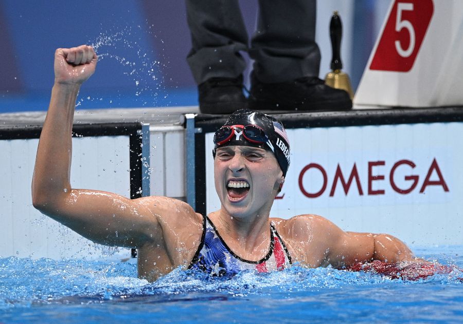 Team USA's Katie Ledecky celebrates after winning the final of the women's 1500m freestyle swimming event during the Tokyo 2020 Olympic Games at the Tokyo Aquatics Centre on July 28, 2021. (Oli Scarff / AFP / Getty Images)