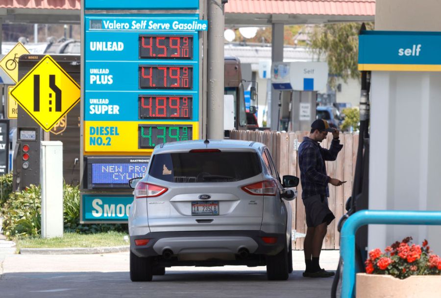 A customer prepares to pump gasoline into his car at a Valero station on July 12, 2021 in Mill Valley. (Justin Sullivan/Getty Images)