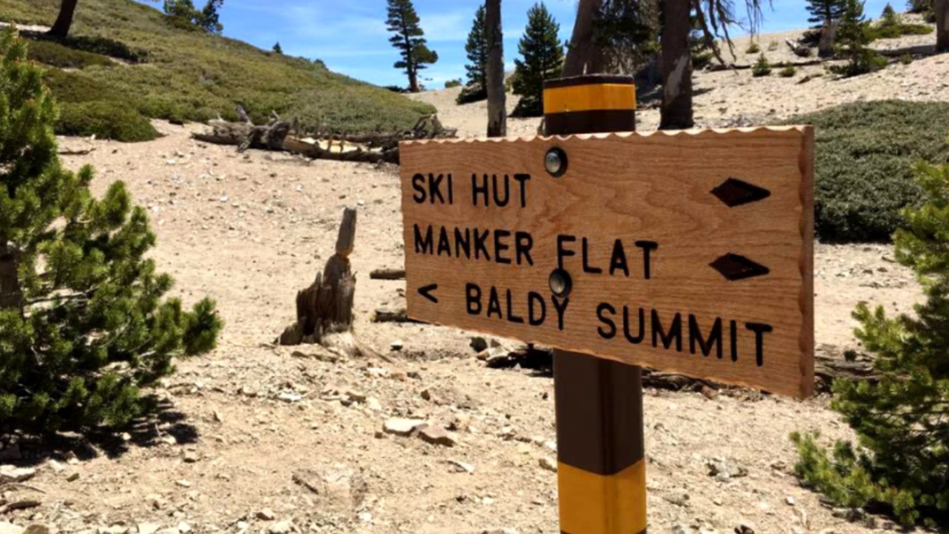 A sign on Mt. San Antonio’s Baldy Bowl trail points the way to the highest point in Los Angeles County.(Los Angeles Times)