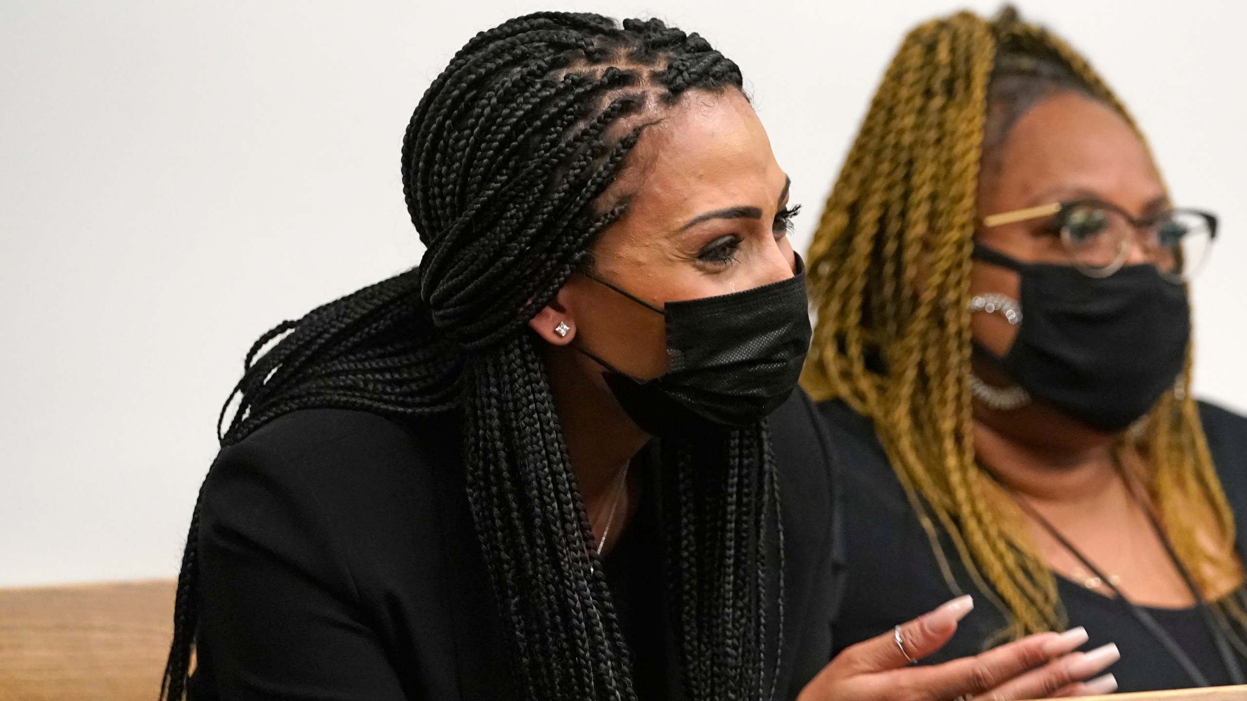 Ashley Sherman, left, wife of NFL player Richard Sherman, spoke in support of her husband at King County District Court, Thursday, July 15, 2021, in Seattle. (AP Photo/Elaine Thompson)