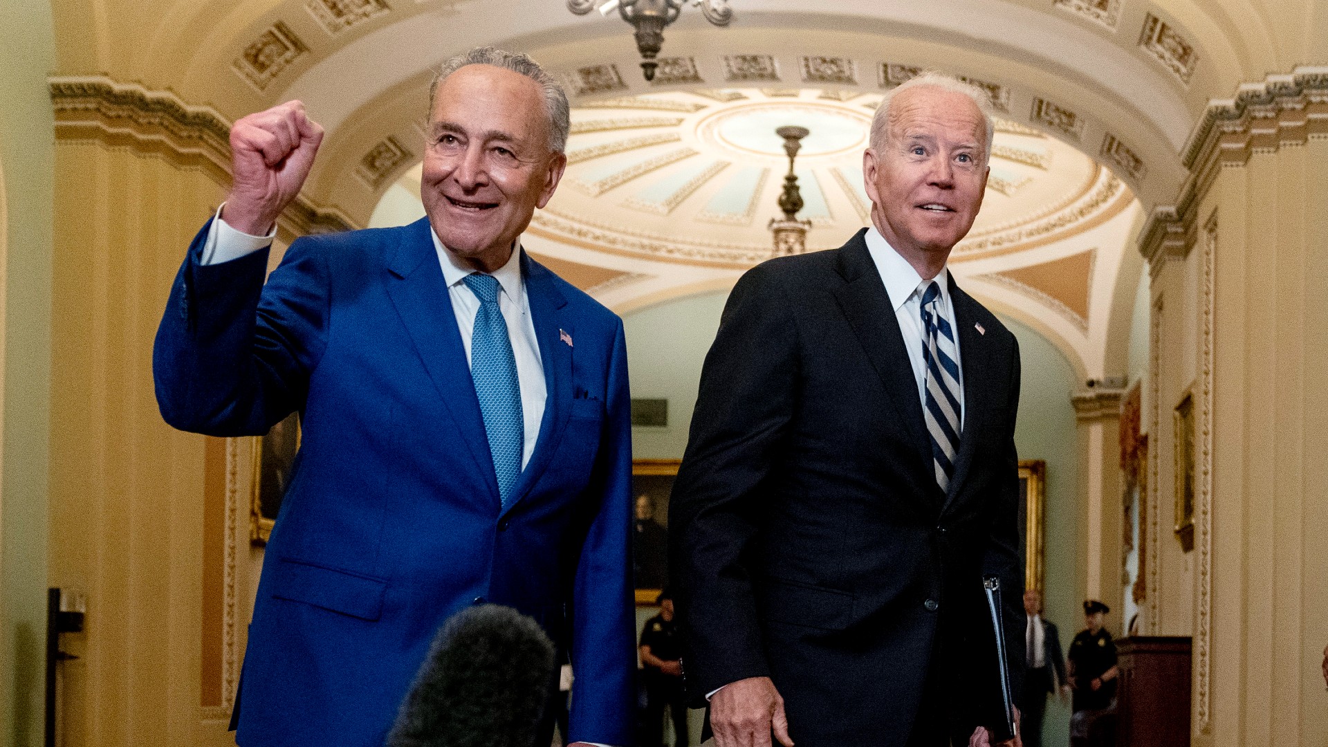 President Joe Biden joins Senate Majority Leader Chuck Schumer, D-N.Y., and fellow Democrats at the Capitol in Washington, Wednesday, July 14, 2021, to discuss the latest progress on his infrastructure agenda. (AP Photo/Andrew Harnik)