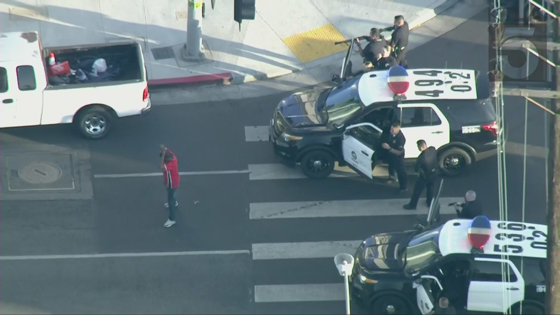 A driver is taken into custody following a pursuit near the Coliseum in Exposition Park on July 19, 2021. (KTLA)