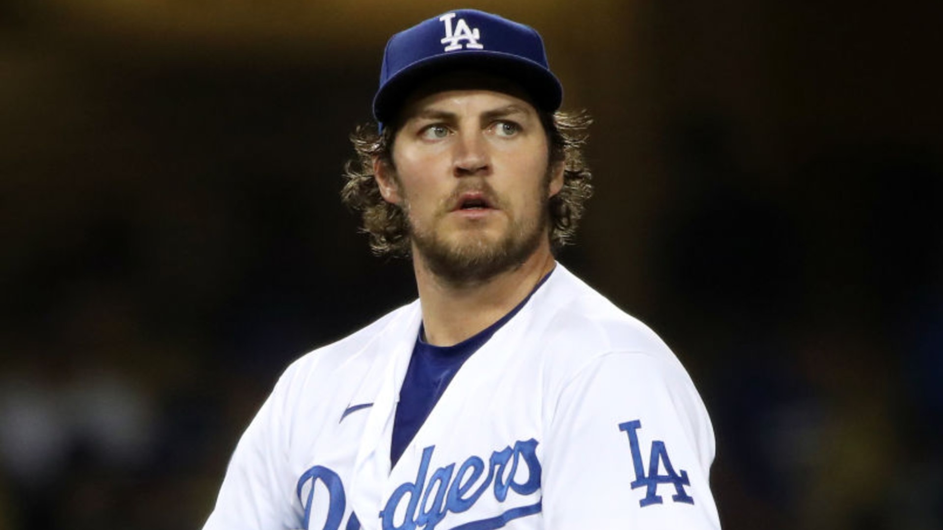 Trevor Bauer of the Los Angeles Dodgers looks on after giving up a hit to Joey Gallo of the Texas Rangers at Dodger Stadium on June 12, 2021. (Katelyn Mulcahy/Getty Images)