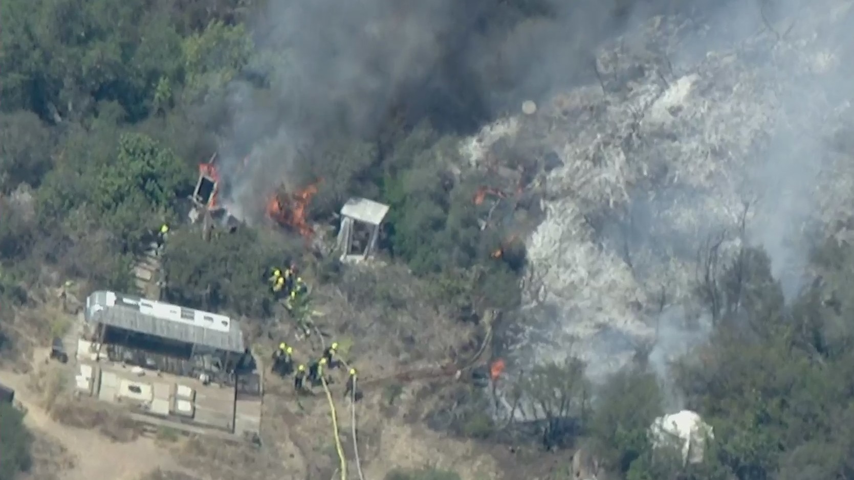 Crews battle the Flores Fire in Topanga on July 19, 2021. (KTLA)