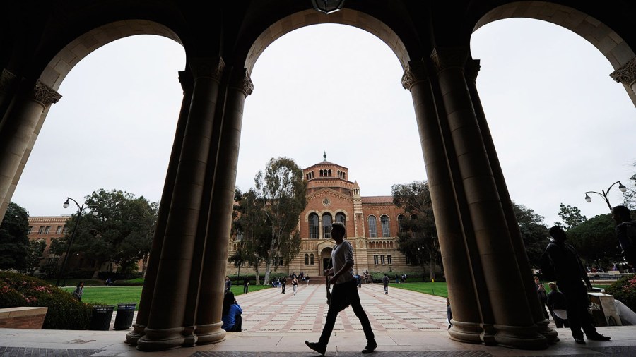 A student walks near Royce Hall on the campus of UCLA on April 23, 2012, in Los Angeles, California. (Kevork Djansezian/Getty Images)