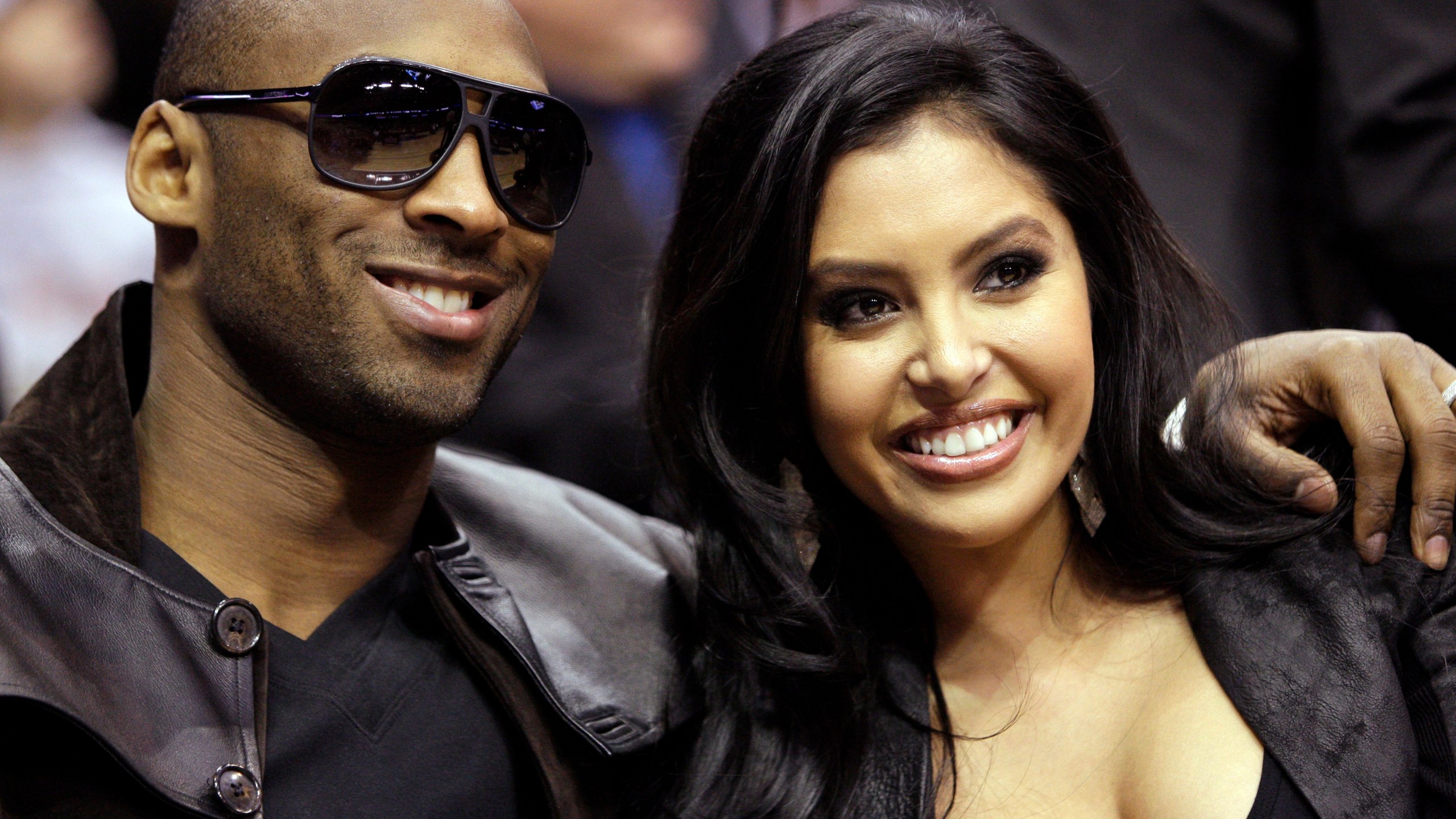 In this Feb. 13, 2010, file photo, Los Angeles Lakers guard Kobe Bryant and his wife, Vanessa, attend the skills competition at the NBA basketball All-Star Saturday Night in Dallas. (AP Photo/LM Otero, File)