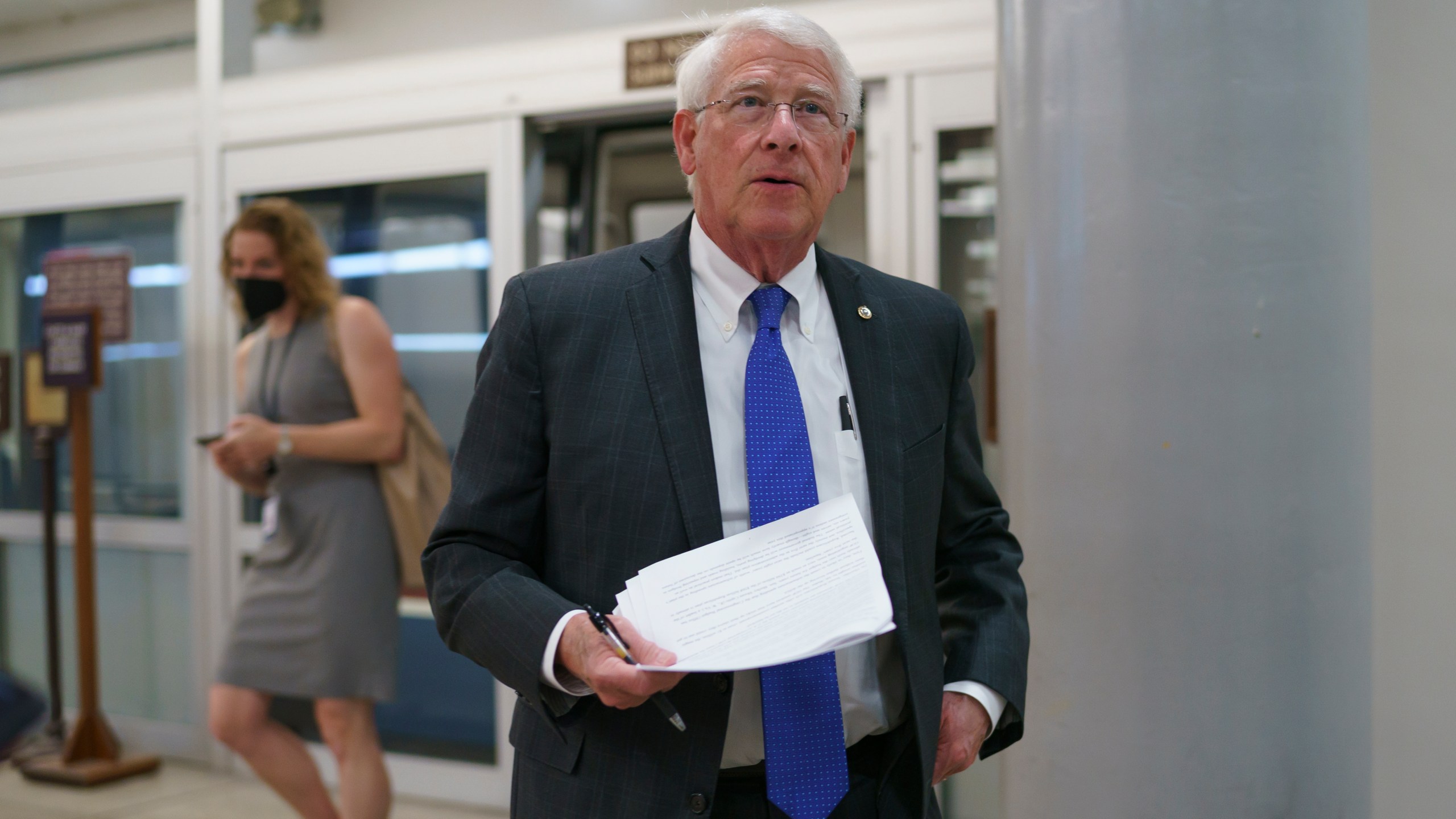 In this Thursday, May 27, 2021 file photo, Sen. Roger Wicker, R-Miss., arrives as senators go to the chamber for votes ahead of the approaching Memorial Day recess, at the Capitol in Washington. Republican Sen. Roger Wicker of Mississippi says installing massive pumps to drain water from the south Mississippi Delta would be a way to fight environmental injustice. He says the project would help low-income and minority residents whose lives are disrupted by flooding. Wicker made his statements to a Senate subcommittee Thursday, July 22, 2021. (AP Photo/J. Scott Applewhite, File)