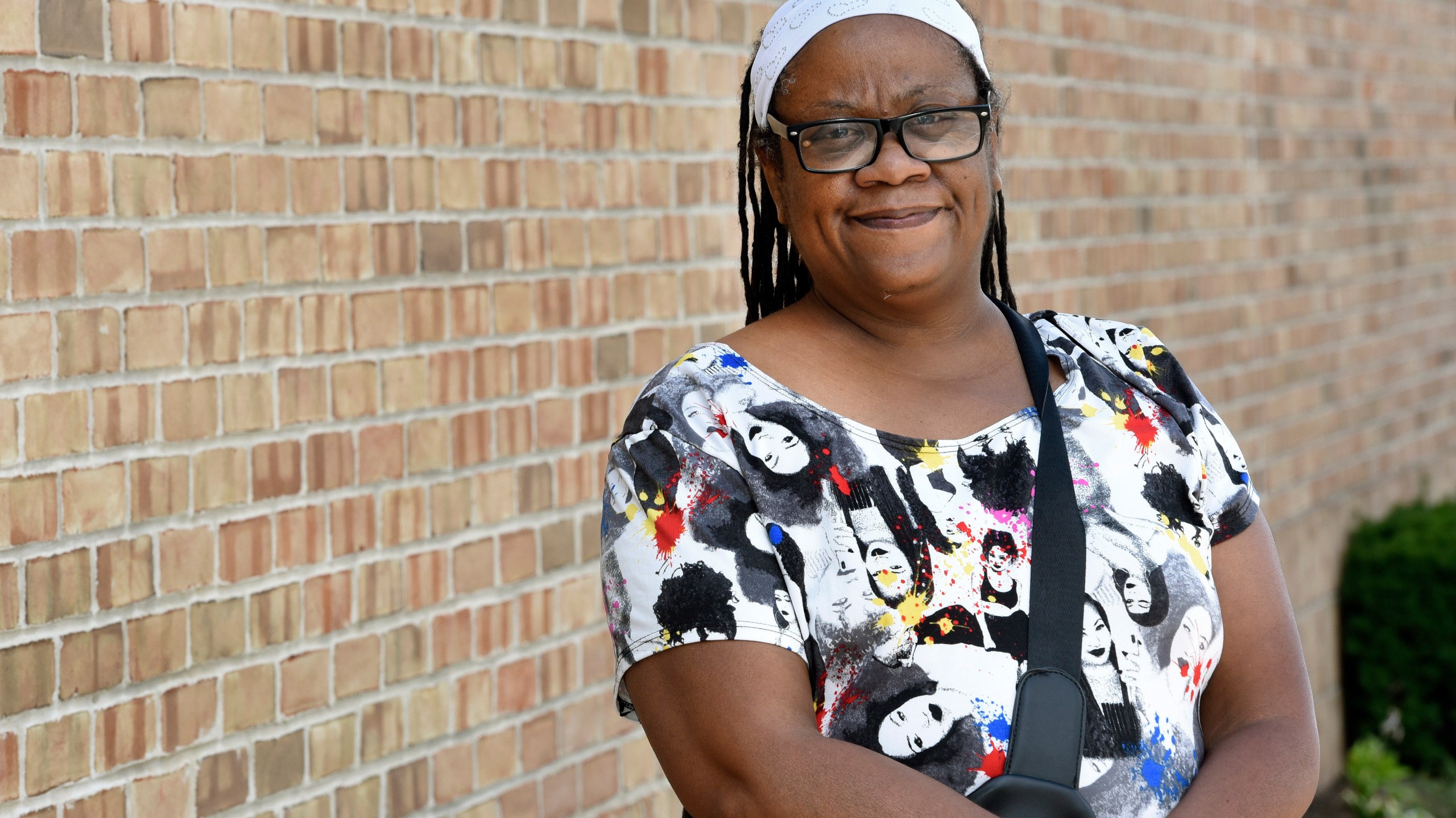 Regina Howard poses for a photo in Southfield, Mich., Friday, July 30, 2021. Lakeshore Legal Aid successfully helped Howard receive $24,550 in federal funds to pay for 15 months of rent. (AP Photo/Jose Juarez)