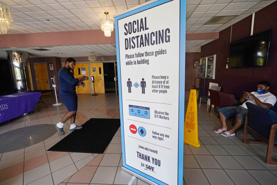 In this July 27, 2021 file photo, social distancing as well as face covering is recommended at the COVID-19 vaccination site in the Rose E. McCoy Auditorium on the Jackson State University campus in Jackson, Miss. (AP Photo/Rogelio V. Solis, File)